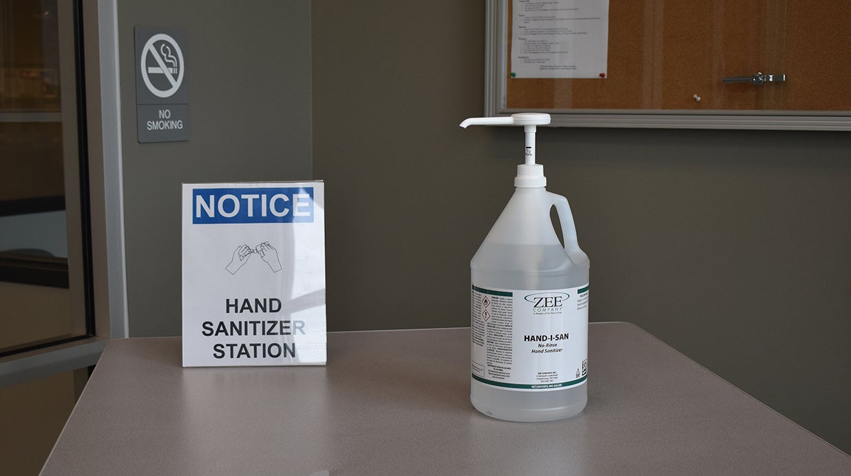 photo of hand sanitizer in entryway