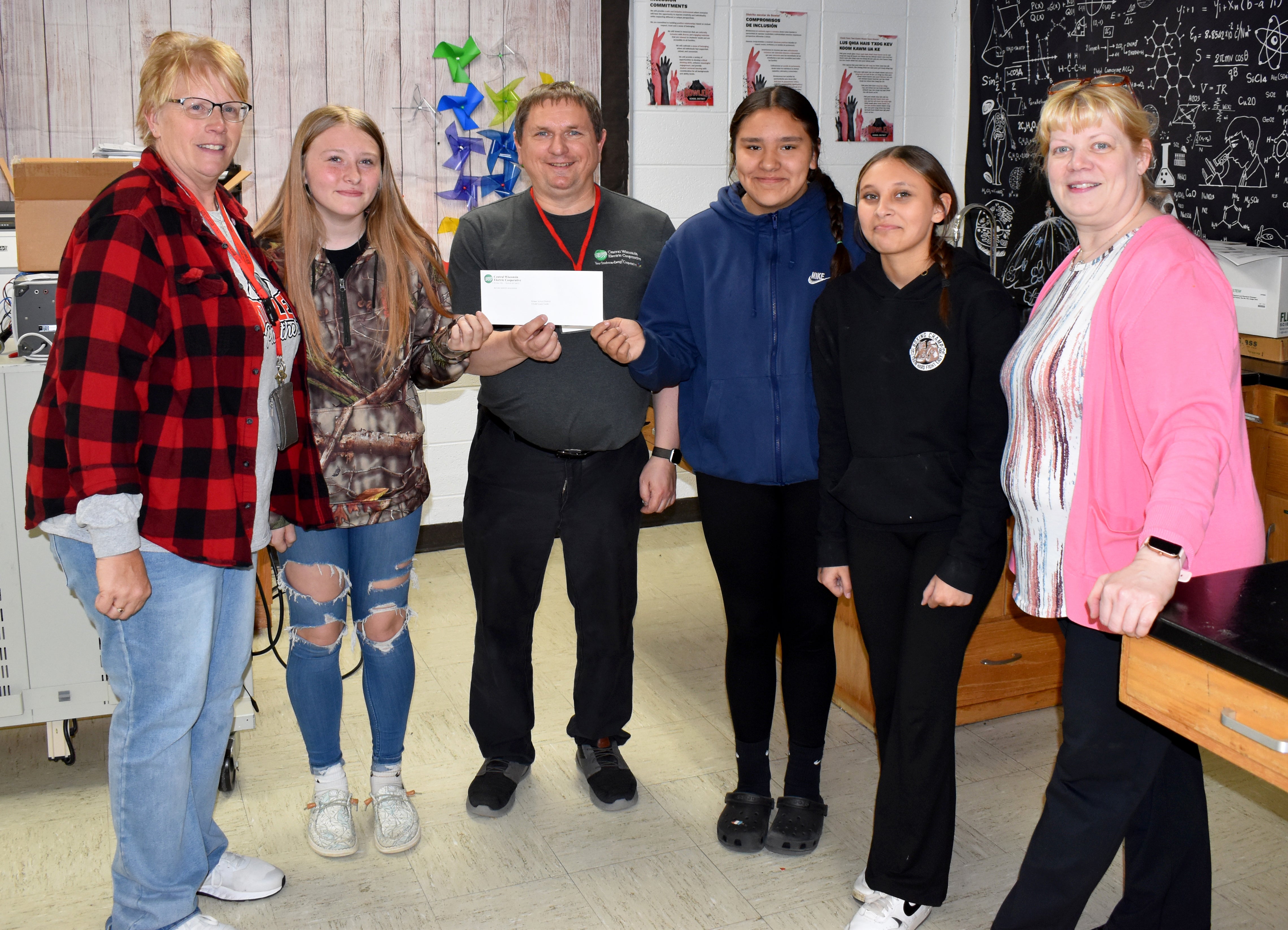 Bowler School District STEAM grant check handoff
